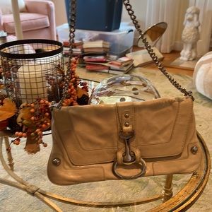 Charles David bag with silver tone hardware. Detachable strap.